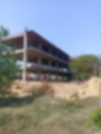 Factory construction site with visible structure and framework