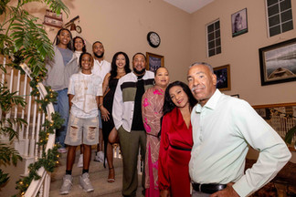 family reunion holiday party standing on staircase