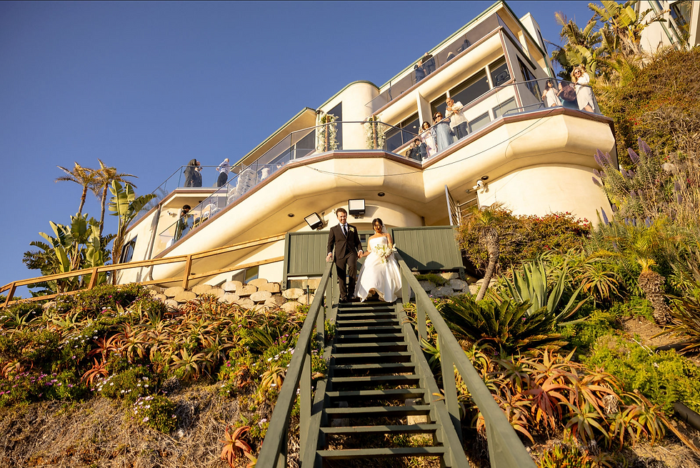 walking on the sand on your beach wedding