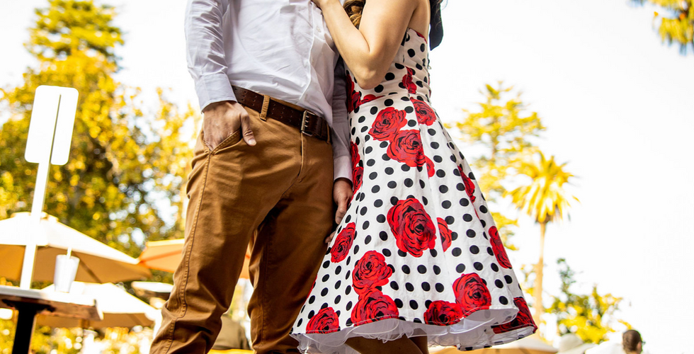Couple kissing at an outdoor engagement photo location