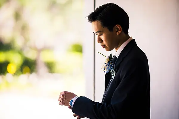 groom getting his last minute touches before the ceremony.webp