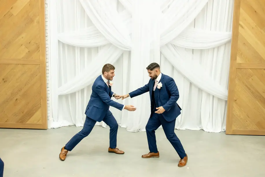 groom and best man mess around