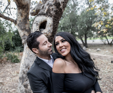 Couple embracing in an outdoor engagement photo location