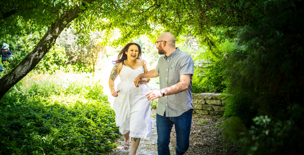 Engagement Photos What to Wear flowy white dress with patterned shirt and denim pants