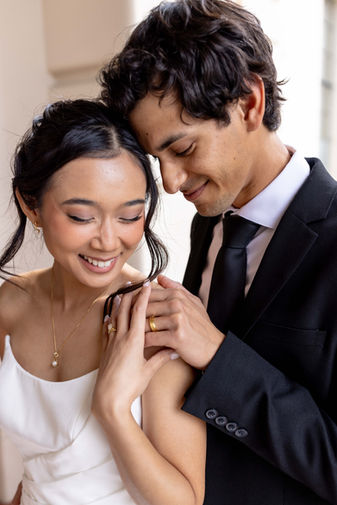 Pasadena City Hall Photographer LA Digital Photo photo requested of groom approaching from behind adoring his bride and her ring on their wedding day
