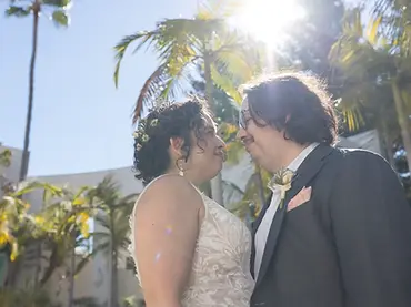Beverly Hills micro wedding couple eskimo kiss in the sunlight