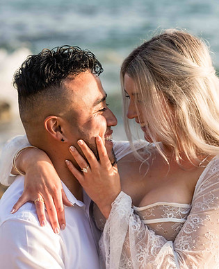proposal-engagment-couple-celebrate-her-ring-on-hand-looking-at-each-other