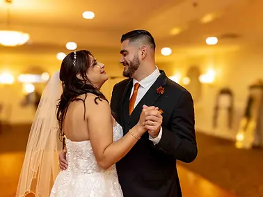 Bride and groom share their first dance at a Luminarias reception in Monterey Park.