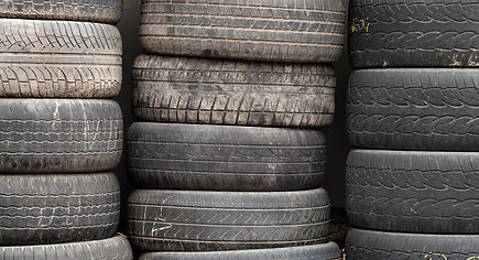 Three stacks of used tires