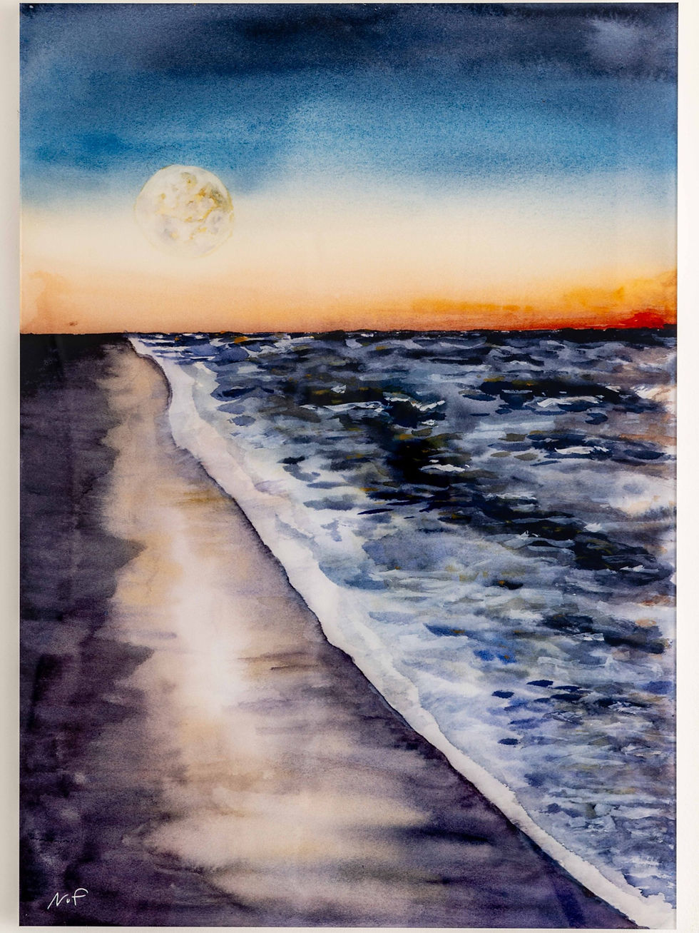 Moon over beach in sunrise