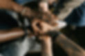 hands_diverse_huddle.jpg