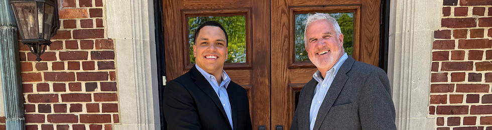 This image shows Mayor Quinton Law & Council man Tom Bader in front of one of the Moorestown Community House entrances.