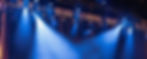 Photo image of Navy blue stage background video cameras and lights, cables_edited.jpg