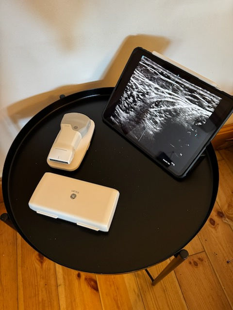 Close-up view of a patient performing rehabilitation exercises with a physical therapist