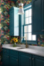 Laundry room with floral wallpaper