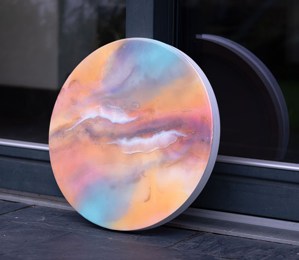 round bespoke art incorporating ashes of a deceased loved one