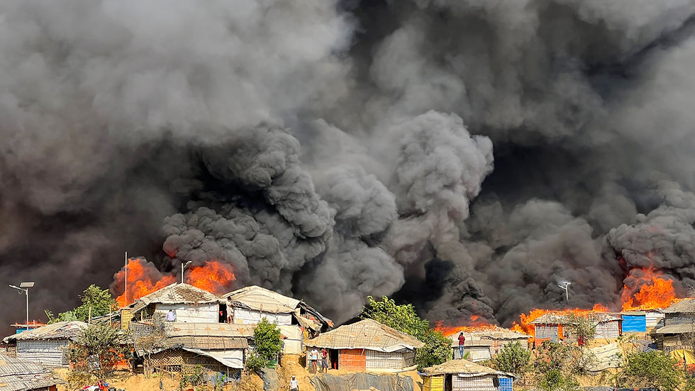 Flames ravage the Cox Bazar refugee camp in Bangladesh on 5 March 2023, leaving 15,000 Rohingyas homeless and destroying 2,800 shelters, along with mosques, schools, and health centres. 2023 © Ro Yassin Abdumonab.