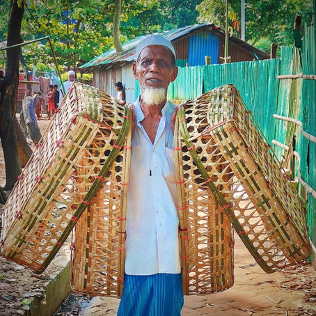 In the heart of the Rohingya refugee camps in Bangladesh, a quiet tradition endures: bamboo cradles gently swinging beneath bamboo roofs.