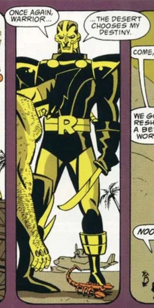 A tall man stands shaded in yellow light. He has a skull pattern on his face. Big shoulder pauldrons. And a really silly capital R for a belt buckle.