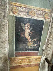 Painting of cherub at the House of the Vettii