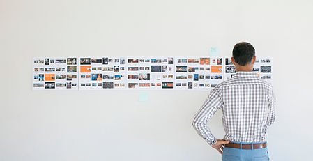 Art director looking at storyboard