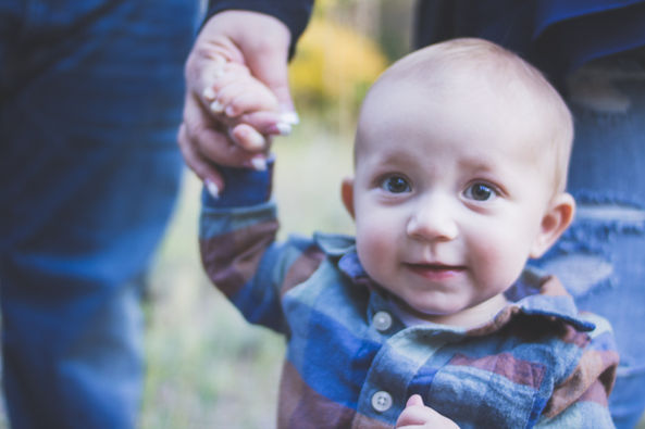 baby boy smiles wide 