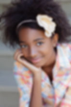 Teenage model photographed in a natural outdoor portrait session