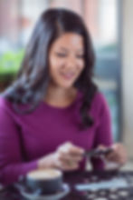 Woman using an online banking service during a commercial lifestyle photography session for banking institution