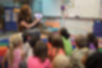 Teacher using a new device and app during a commercial lifestyle photography session
