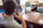 Business executive using a phone to demonstrate a new wireless service provider for lifestyle product photo shoot