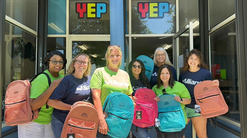 Volunteers with Backpacks
