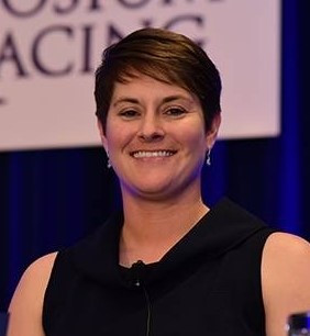 Ashly Mohoric, young smiling white woman with short brown hair