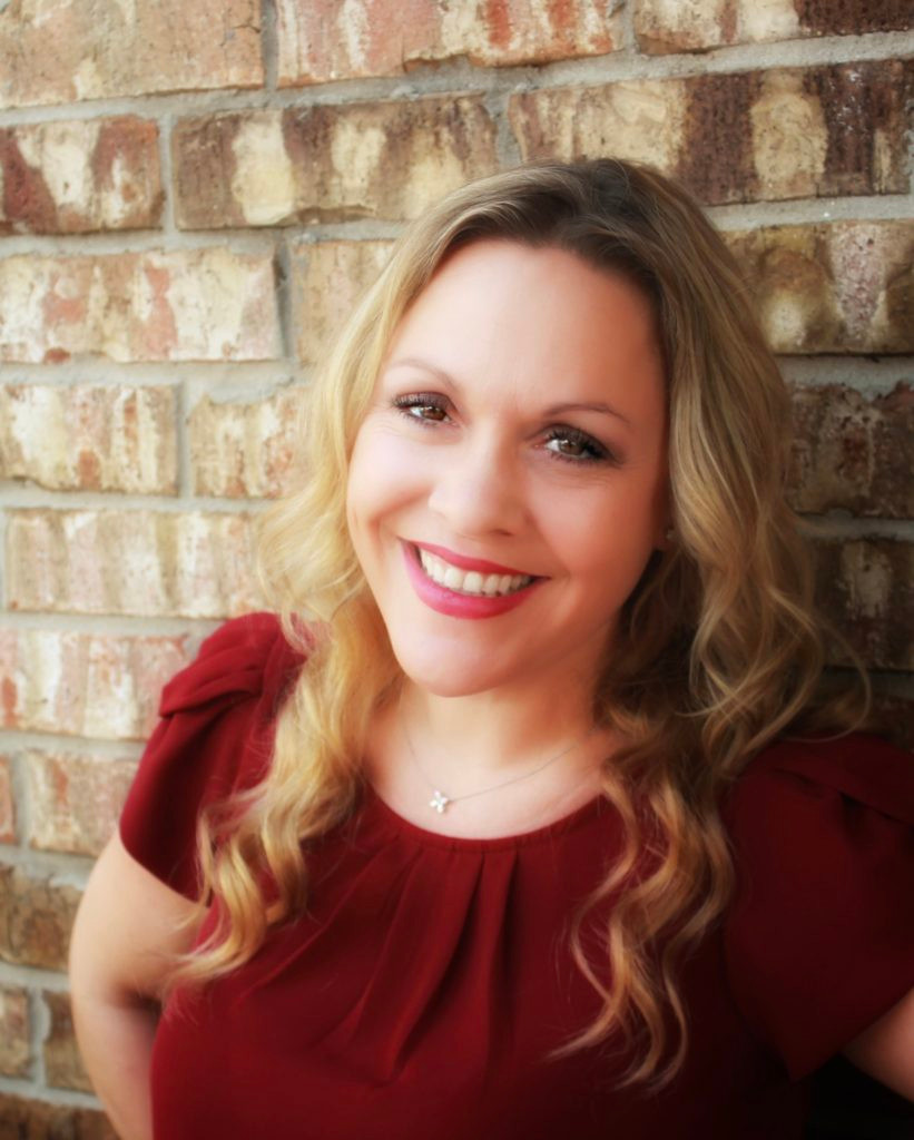 Christie Lawler, young smiling blond woman in red shirt