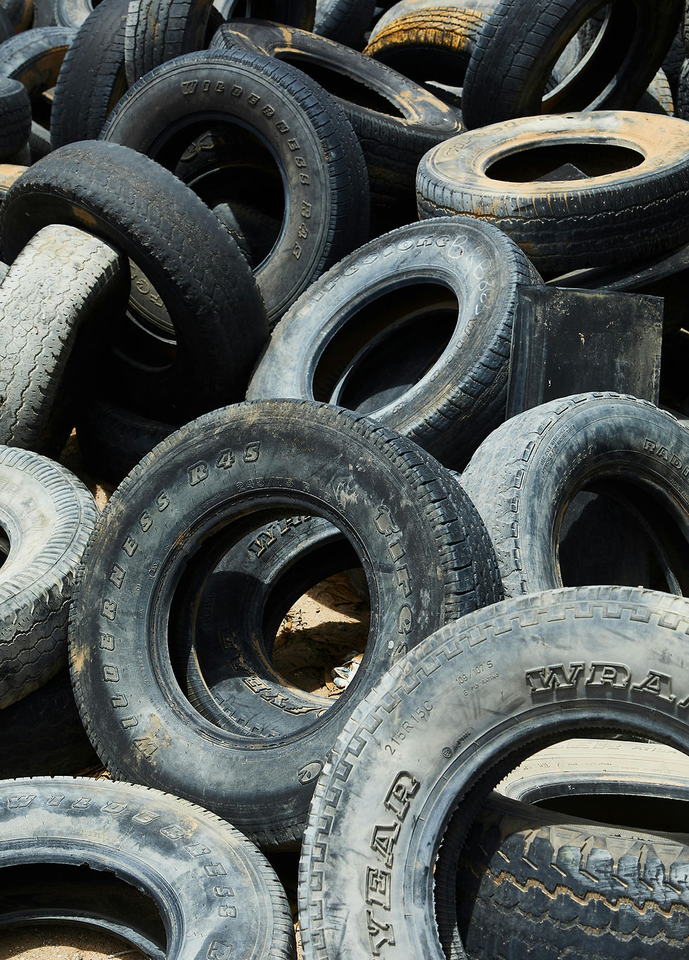 Pile of used tires representing industrial recycling and sustainability.