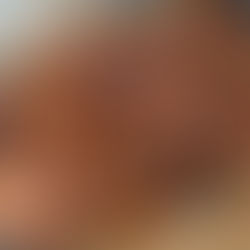 A tray of dark Kvass Croissant pudding looking glossy, sweet and delicious.