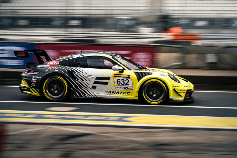 Micha Charoudin in his Fanatic Porsche GT3 during NLS race at Nürburgring Nordschleife, leaving the Pit in endurance racing.
