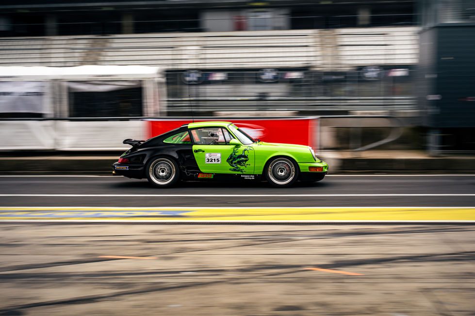 Porsche during NLS race at Nürburgring Nordschleife, leaving the Pit in endurance racing. Hofor Racing