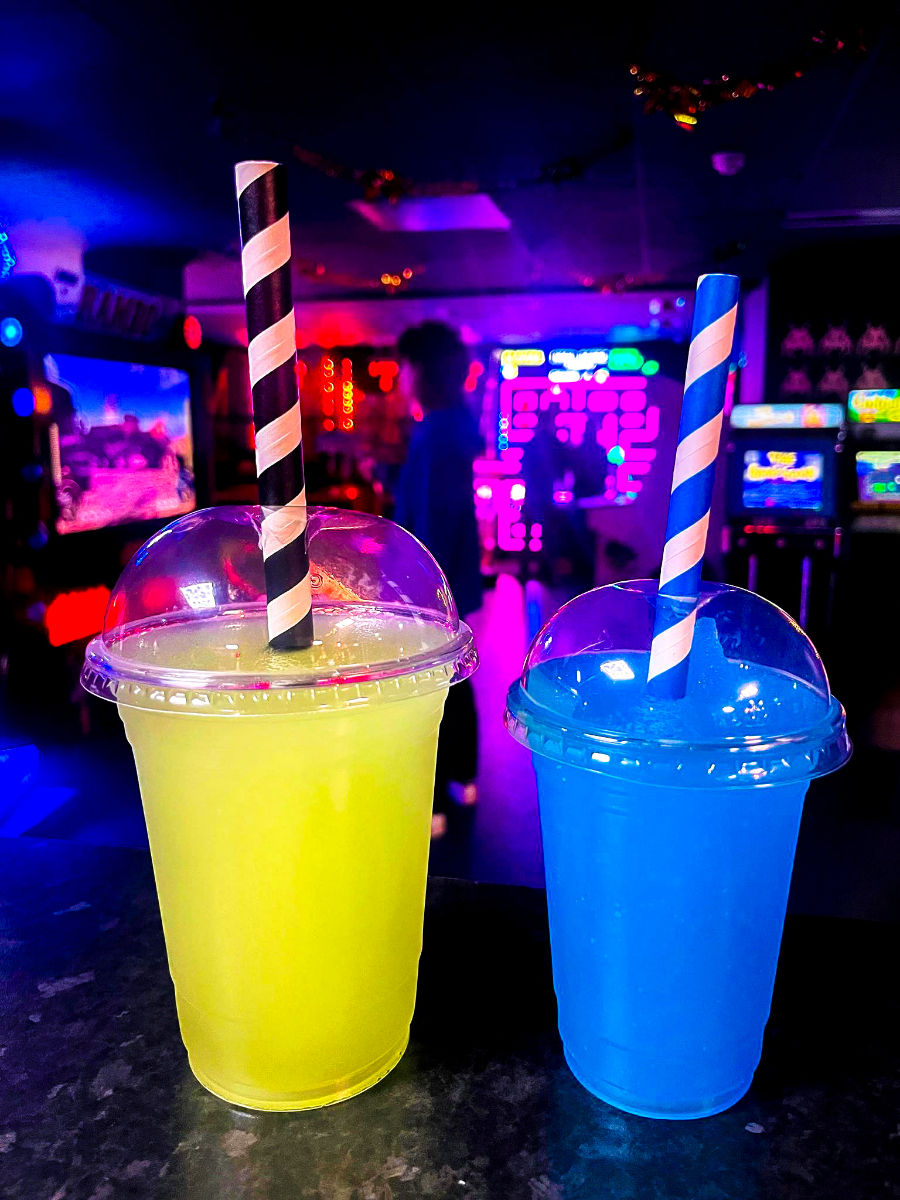 Yellow and blue slushie drinks at a Plymouth arcade