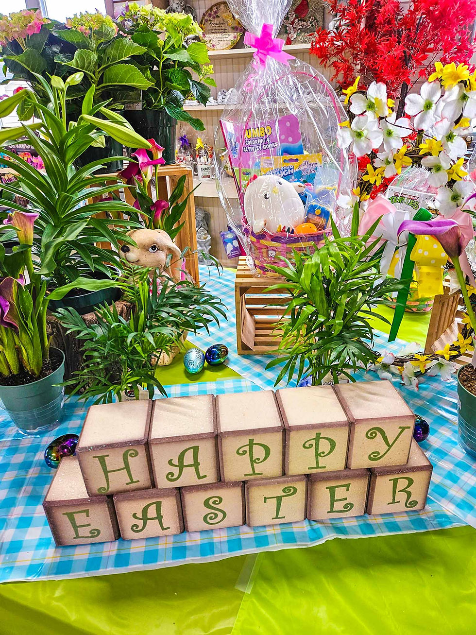 Happy Easter blocks, potted plants, and flowers