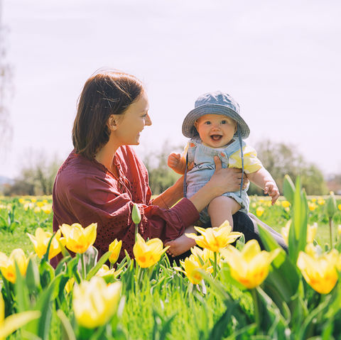 baby in tulip field