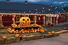 A large jack-o'-lantern and pumpkins displayed at Fall Nights.