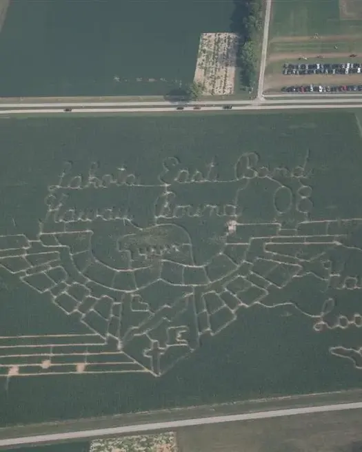 Aerial view of a corn maze shaped with musical notes