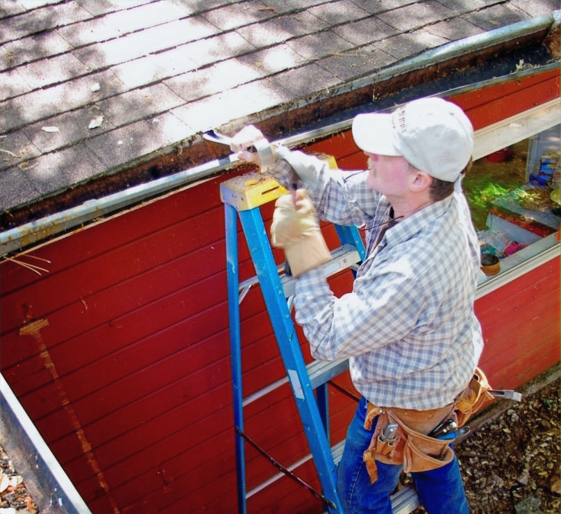 Don Mitchell removing old gutter_edited_edited.jpg