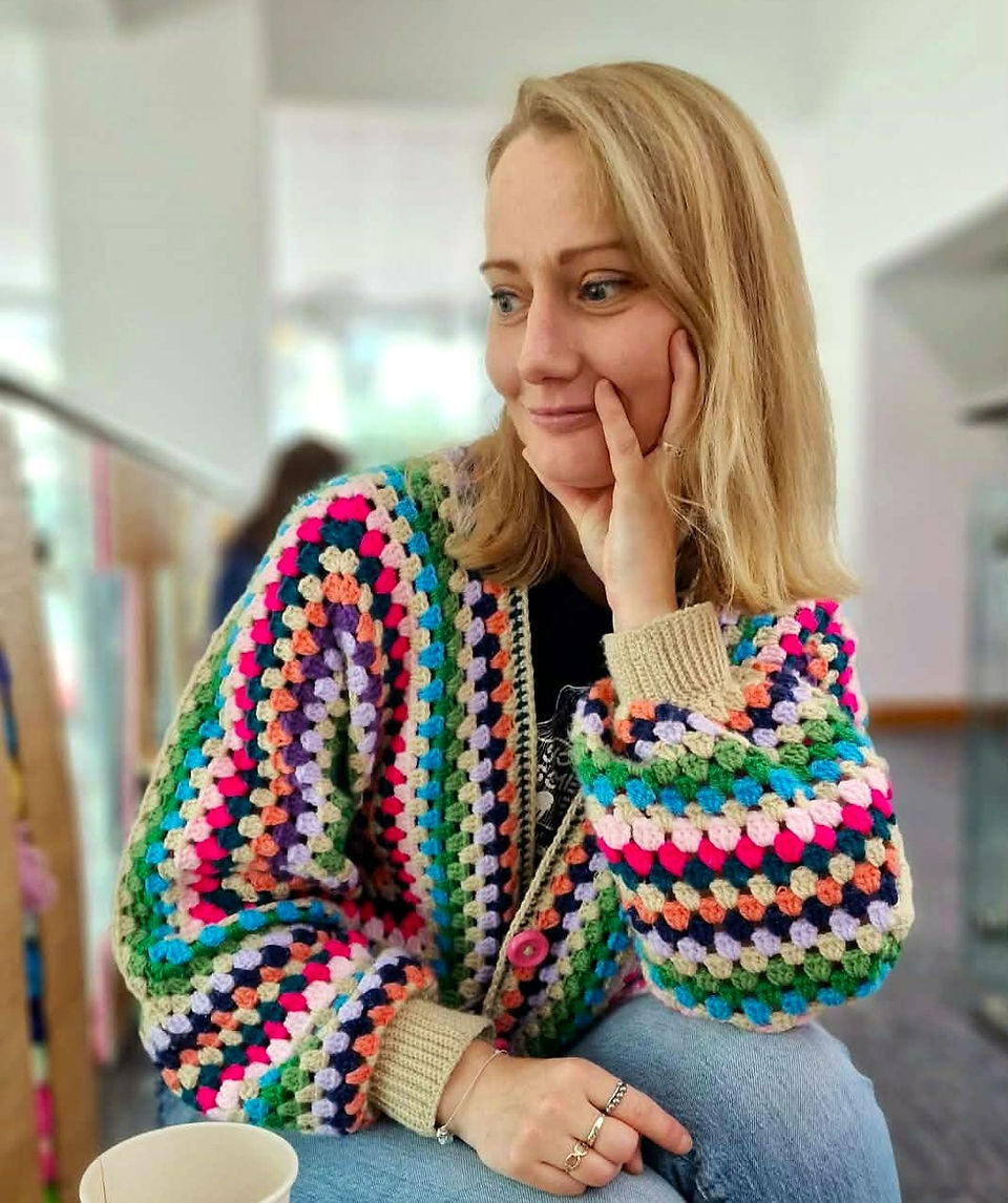 Amanda Jones wearing crochet cardigan