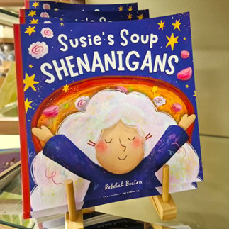 Book Susie's soup shenanigans with illustration of woman with big white hair on the front