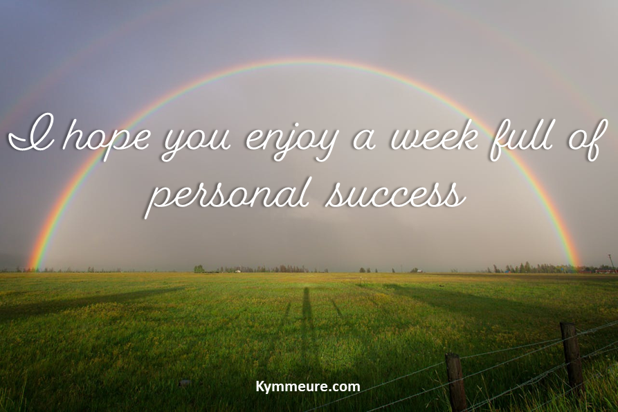 A rainbow arches over a green field with the text "I hope you enjoy a week full of personal success" and "kymmeure.com" below.