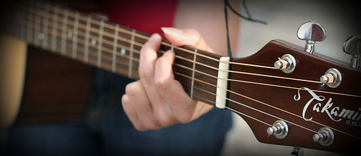 Mary Playing Guitar