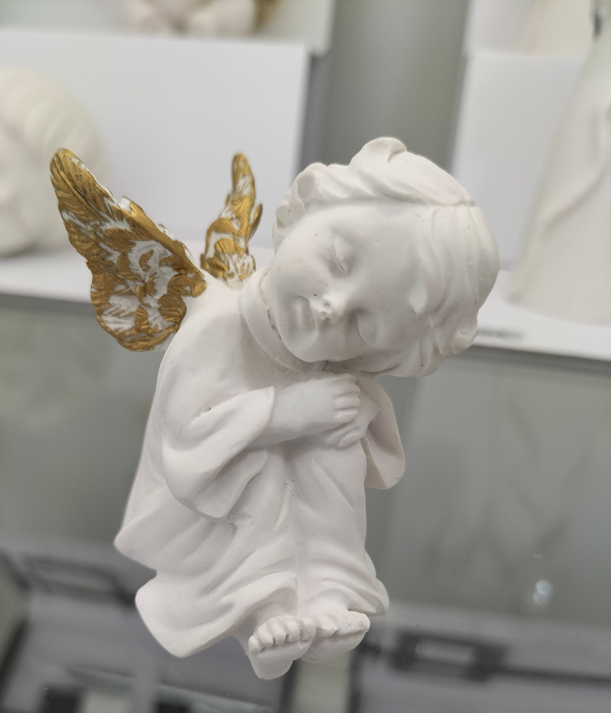 Anjo em cerâmica