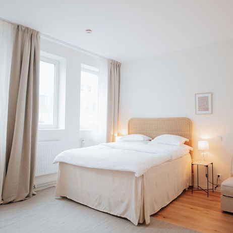 cozy hotel bed in apartment hotel in Stockholm