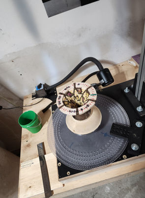 Pottery wheel with a ceramic vase being crafted